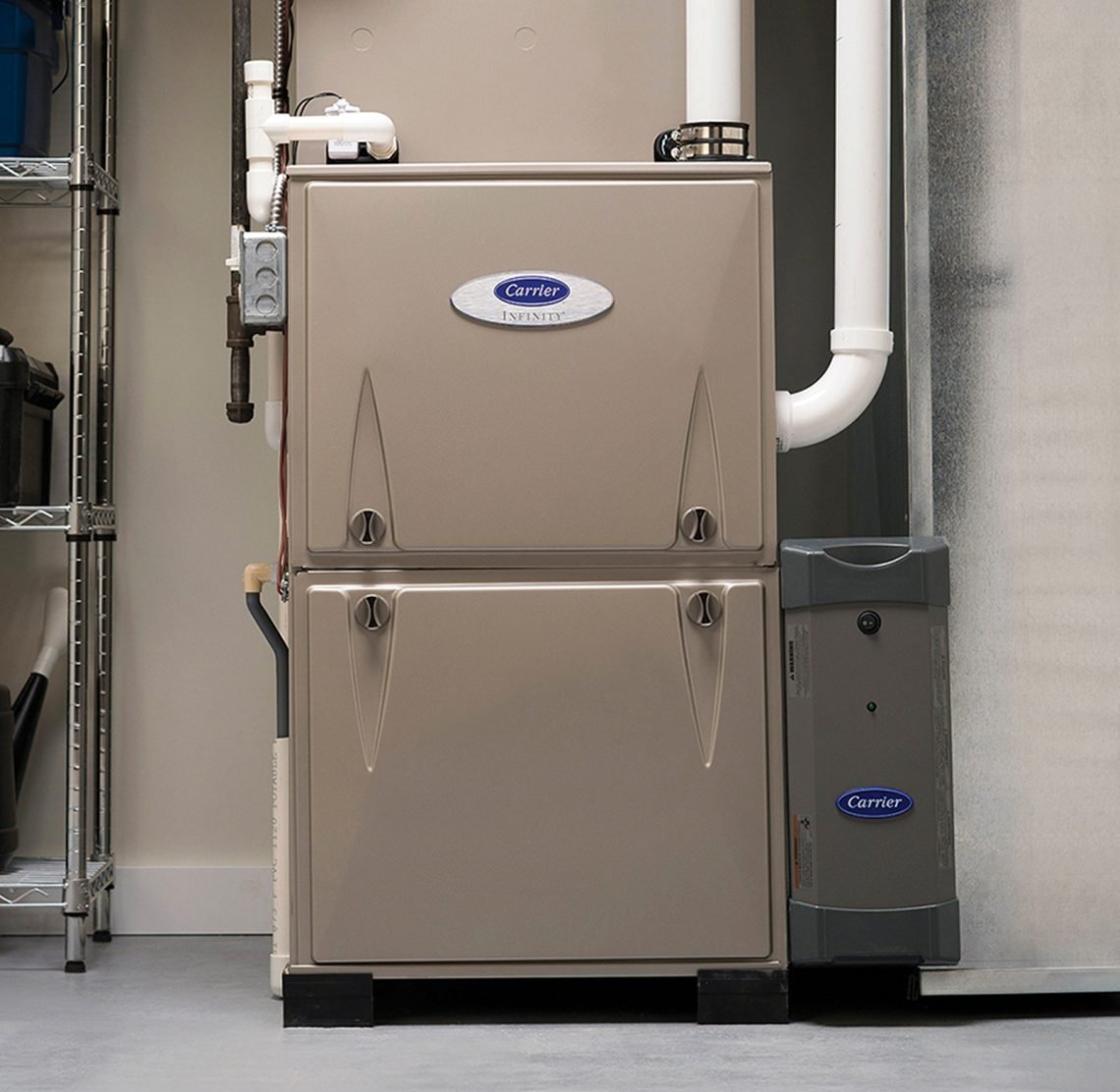 High-efficiency Carrier Infinity gas furnace installed in a home utility room.
